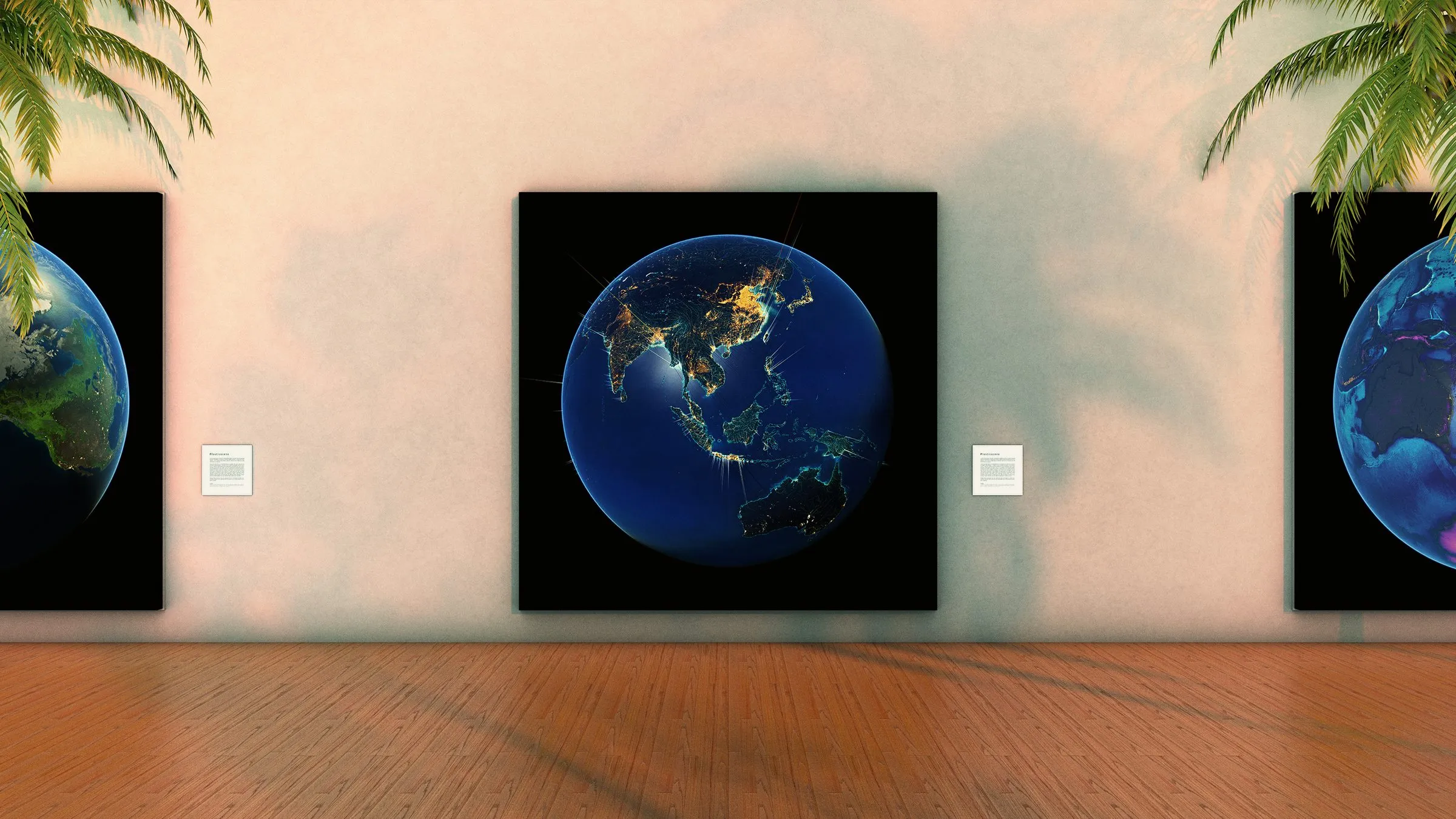 Three large globe artworks displayed in a gallery setting with informational plaques