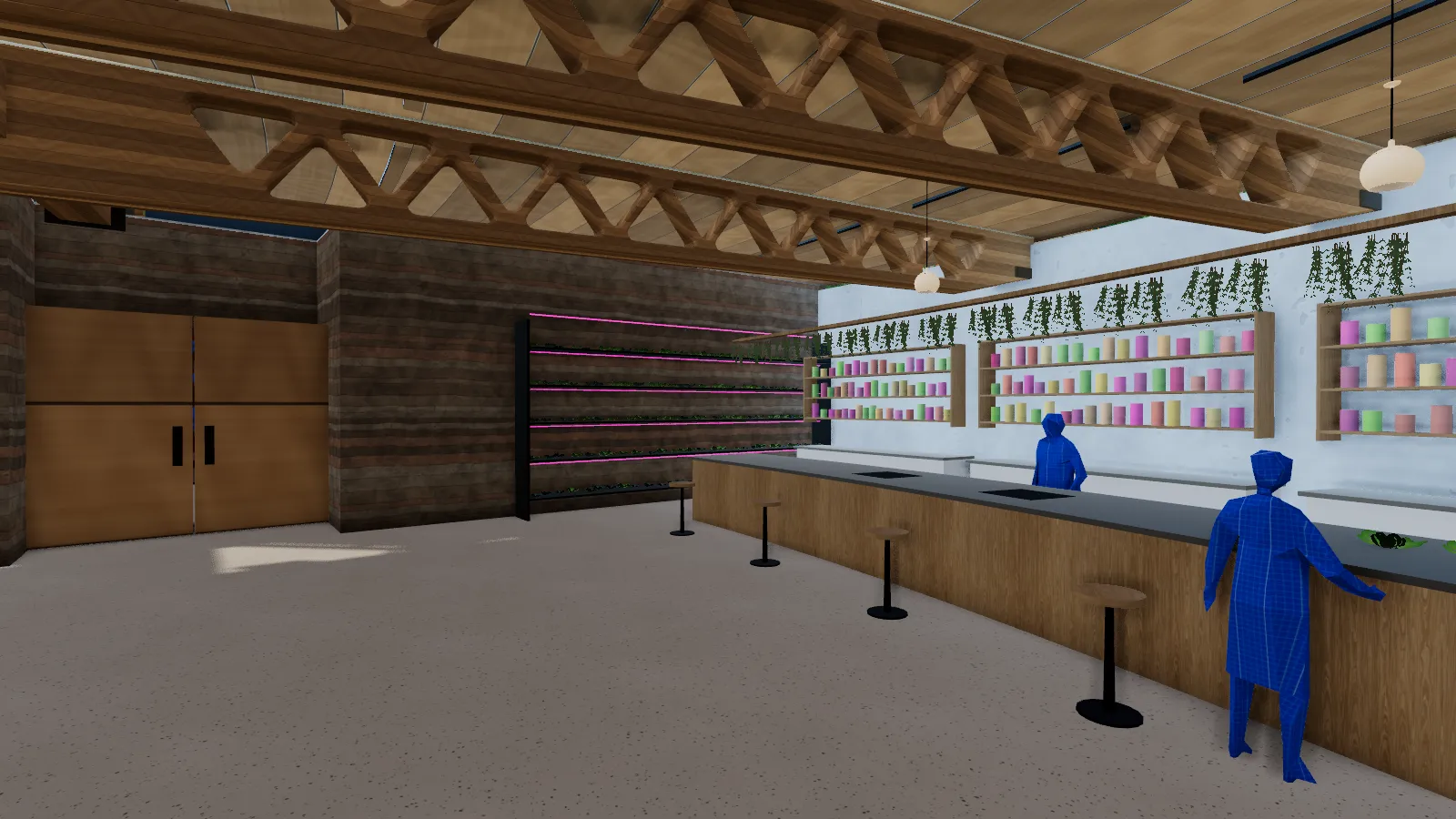 A kitchen classroom with a long island, stools, a grow wall of seedlings and shelves of coloured jars.